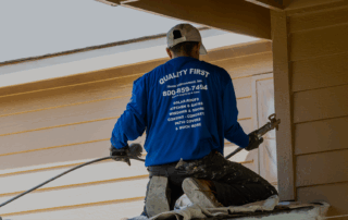 Quality First Home Improvement Installer Spraying Exterior Coating in Sacramento, CA